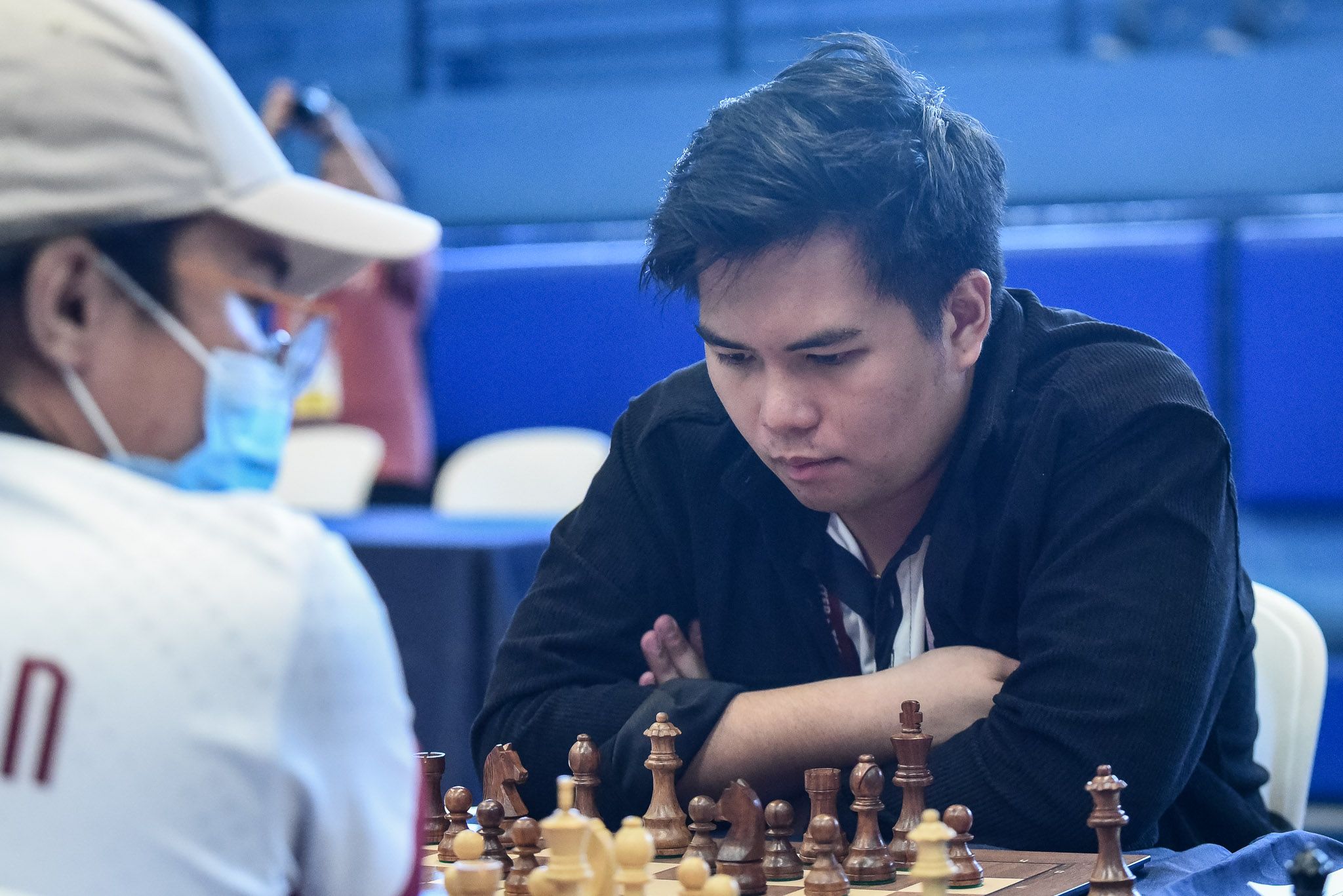 FIDE Master Christian Mark Daluz of UST in action in the UAAP Season 87 men's chess tournament. UAAP Media